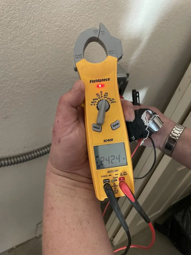 Voltage testing with clamp meter during Aluminum Wiring Replacement in Greenville